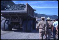 Close view of truck transporting gravel to Cerrón Grande Hydroelectric dam construction site
