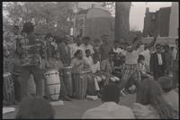 A man interacts with the crowd in front of drummers around Dupont Circle in Washington, D.C., undated