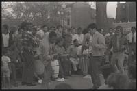 Two men dance in front of a group of drummers during a performance at Dupont Circle in Washington, D.C., undated