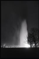 A light shines on a fountain at East Potomac Park, Washington, D.C., undated