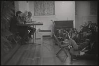 People lounge on the floor during a meeting with Charles Cassell and Paul Jacobs at Concordia Church, Washington, D.C., 14 February 1968 or 1969