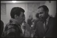 Charles Cassell speaks to a man during a meeting at Concordia Church, Washington, D.C., 14 February 1968 or 1969