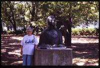 Leslie Morginson-Eitzen standing near Sor Juana de la Cruz sculpture