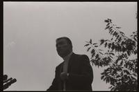 Former U.S. Representative Adam Clayton Powell points to his heart as he addresses a crowd in the Woods-Brown Amphitheater at American University, 13 October 1968