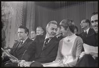 Senator Eugene McCarthy speaks with the woman sitting by him at the Unity Day Rally hosted in the Mayflower Hotel, Washington, D.C., 10 November 1968