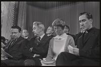 Senator Eugene McCarthy sits by his supporters and the priests dissenting the Humanae Vitae at the Unity Day Rally hosted in the Mayflower Hotel, Washington, D.C., 10 November 1968