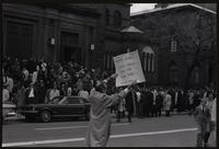 A man holds a sign supporting Washington Region Archbishop Patrick O'Boyle during a demonstration outside St. Matthew's Cathedral, Washington, D.C., 10 November 1968
