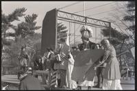 The Youth International Party (Yippies) puts on a performance to introduce their mascot and "first lady" Mrs. Pigasus on the National Mall prior to the counter-inaugural of President Richard Nixon, Washington, D.C., 16 January 1969