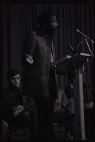 Dick Gregory gives an animated address to American University students in the Leonard Center, Washington, D.C., 16 February 1969