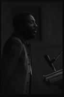 Dick Gregory delivers an address to American University students in the Leonard Center, Washington, D.C., 16 February 1969