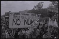 Anti-nuclear demonstrators from the D.C. Socialist Workers Party carry a sign through the protest that reads "No to nuclear power & nuclear weapons, human needs before profits, no nukes" down Pennsylvania Avenue in Washington, D.C., 06 May 1979