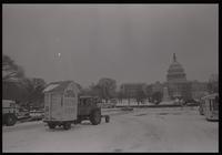 An outhouse, dubbed "Hotel Carter," attached to a tractor parked on the National Mall near the U.S. Capitol Grounds in participation with the American Agriculture Movement's second Tractorcade demonstration in Washington, D.C., 28 February 1979