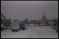 An outhouse, dubbed "Hotel Carter," that is attached to a tractor parked on the National Mall near the U.S. Capitol Grounds in participation with the American Agriculture Movement's second Tractorcade demonstration in Washington, D.C., 28 February 1979