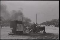 Farming vehicles burn on the National Mall during the American Agriculture Movement's second Tractorcade demonstration in Washington, D.C., 28 February 1979