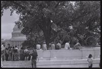 Anti-nuclear protesters surround the Artillery statue of the Ulysses S. Grant Memorial on the U.S. Capitol Grounds in Washington, D.C., 06 May 1979