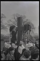 Actors are mock crucified during the Committee for a Sane Nuclear Policy's Vietnam Passion Play staged outside the White House, Washington, D.C., 06 April 1969