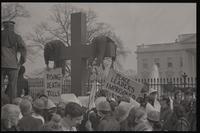 Actors are mock crucified as part of the Committee for a Sane Nuclear Policy's Vietnam Passion Play put on outside the White House, Washington, D.C., 06 April 1969