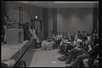 Meeting participants listen to a speaker from the New AU group while they discuss student parity on faculty committees at American University, Washington, D.C., 24 April 1969