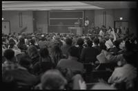 Two people from the New AU group address the crowd while holding a meeting about student parity on faculty committees at American University, Washington, D.C., 24 April 1969