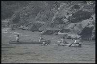 A group of canoers paddles down the Potomac River during a whitewater canoe race between Great Falls and Sycamore Island, 04 May 1969
