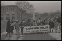 Young demonstrators, participating in an anti-smoking rally, carry protest signs and banners, Washington, D.C., 11 January 1970