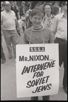 An adolescent boy pleads for President Nixon to intervene in support of Soviet Jews during a demonstration outside the U.S. Capitol Building, Washington, D.C., 19 June 1973