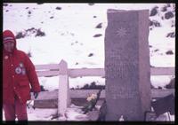 Leslie Morginson-Eitzen standing near Ernest Henry Shackleton's tombstone