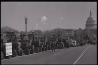 A line of tractors parked along the National Mall near the U.S. Capitol Building during the first Tractorcade demonstration in Washington, D.C., 18 January 1978