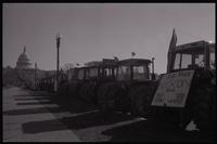 Tractors parked in a line along Pennsylvania Avenue near the U.S. Capitol Building during the first Tractorcade demonstration in Washington, D.C., 18 January 1978