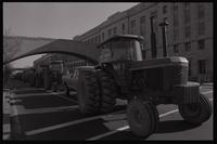 Tractors drive down Independence Avenue SW during the first Tractorcade demonstration in Washington, D.C., 18 January 1978