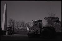 Tractors park near the Washington Monument in protest during the first Tractorcade demonstration in Washington, D.C., 18 January 1978