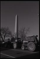 Tractors parked near the Washington Monument in participation with the American Agriculture Movement Farmer's Strike and Tractorcade, 18 January 1978