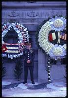 Jack Child standing near Cuba and United States wreaths
