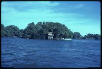 House and boat on island surrounded by Lake Nicaragua 