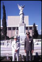 Jack Child and Brazilian Colonel standing with Rubén Darío monument in background
