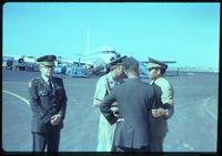 Jack Child standing near Lieutenant Colonel Meserve, Brigadier General Graham, and Brigadier General Gutierrez in conversation