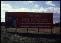 View of Miliciano billboard in field