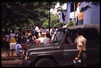 Vendors and on-lookers surrounding city hall during Sandinista demonstration 