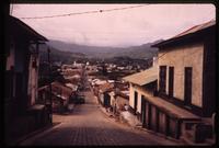 View of hilly street in Matagalpa with mountains in background