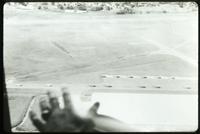Aerial view of Army aircraft on runway