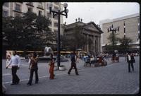 Locals walking through Plaza de Armas 
