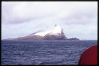 View of mountain peak at Albatross Island from World Discoverer