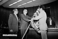 U.S. Ambassador Deane Hinton Hands A U.S. Flag To Roberto D'Aubuisson In The Constituent Assembly