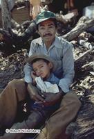 A Displaced Father And Son In Liberated FPL Territory in Chalatenango Department