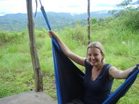 Rachel Teter sits in a hammock at a Peace Corps Volunteer's home in Barrigón, Panama