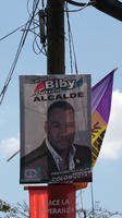 A banner for a local politician hangs from a telephone pole, Escobal, Panama