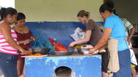 Rachel Teter helps others prepare food for her farewell party, El Plátano, Panama 