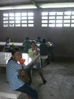 Children eating at the school cafeteria, El Plátano, Panama