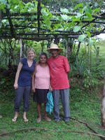 Rachel Teter posed with couple under vines in El Barrigón, Panama