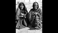 Two Women Wait for Winter Supplies on the Darzak Plains of Afghanistan, c. 1971-1973